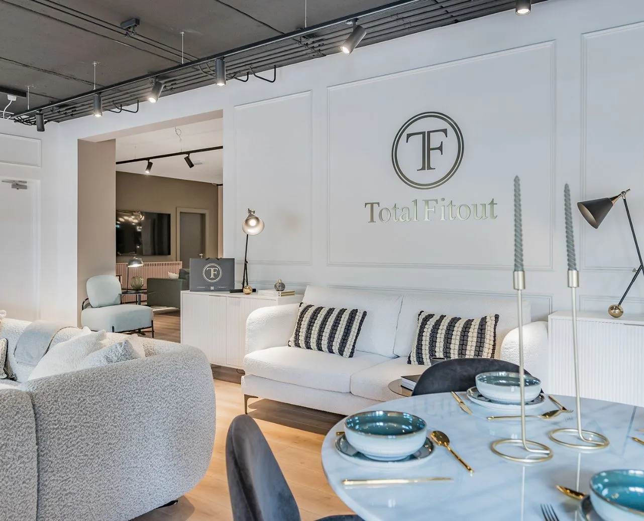 total fitout logo on backwall for showroom